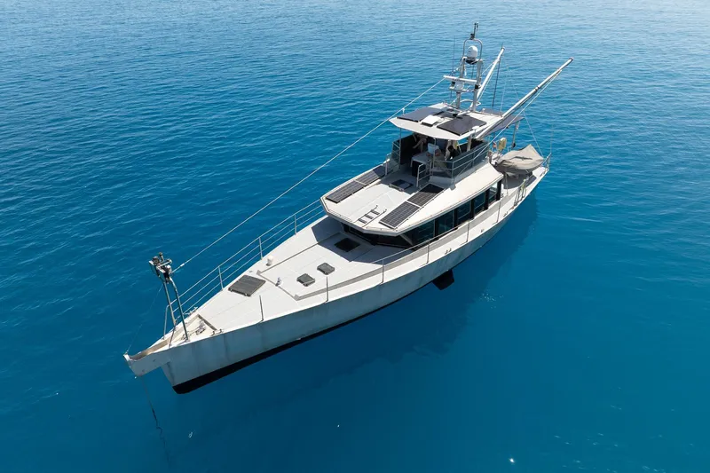 Toccata Yacht Photos Pics Circa Marine FPB64 yacht from 2011 on clear blue water.