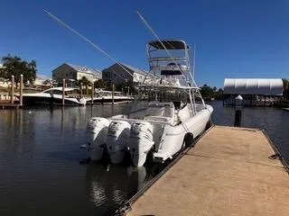  Yacht Photos Pics 2016 Intrepid 400 Center Console boat docked at marina with four outboard engines.