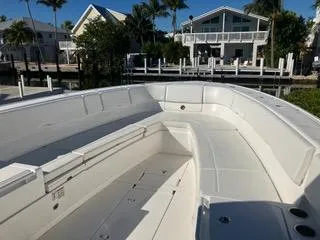  Yacht Photos Pics 2016 Intrepid 400 Center Console boat docked near waterfront homes.