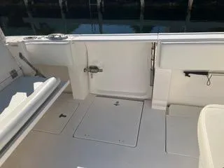  Yacht Photos Pics 2016 Intrepid 400 Center Console boat interior with storage compartments and seating.