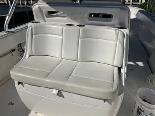  Yacht Photos Pics 2016 Intrepid 400 Center Console boat with white cushioned seating.