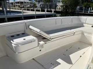  Yacht Photos Pics 2016 Intrepid 400 Center Console boat with spacious seating and storage, docked at a marina.
