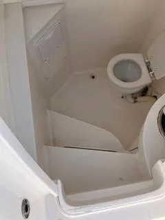  Yacht Photos Pics 2016 Intrepid 400 Center Console boat bathroom interior with toilet.