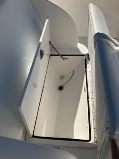  Yacht Photos Pics Open storage compartment on a 2016 Intrepid 400 Center Console boat.