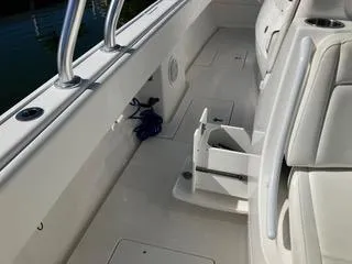  Yacht Photos Pics 2016 Intrepid 400 Center Console boat interior with white seating and deck.