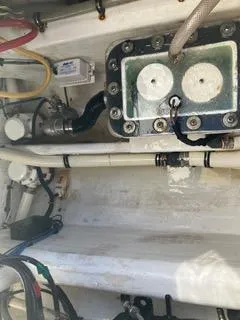  Yacht Photos Pics Engine compartment of a 2016 Intrepid 400 Center Console boat, showing wiring and components.