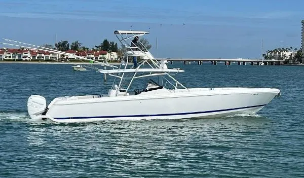  Yacht Photos Pics 2016 Intrepid 400 Center Console boat cruising on a sunny day.