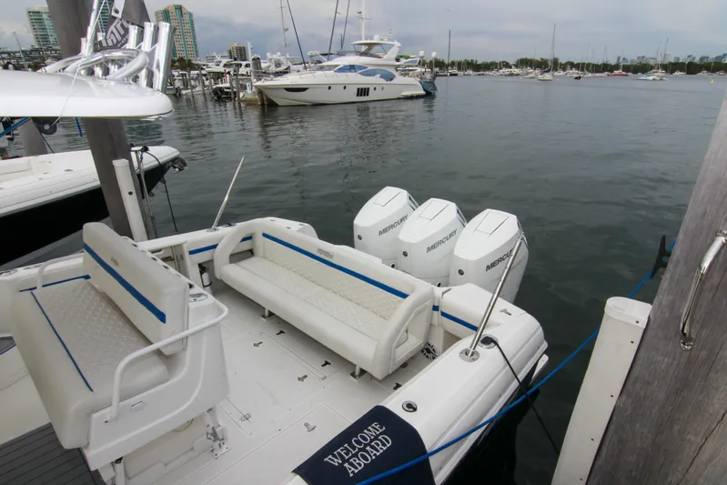  Yacht Photos Pics 2003 Intrepid 377 Walkaround boat docked with triple Mercury engines.