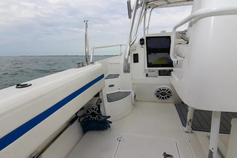  Yacht Photos Pics 2003 Intrepid 377 Walkaround boat interior with navigation equipment and ocean view.