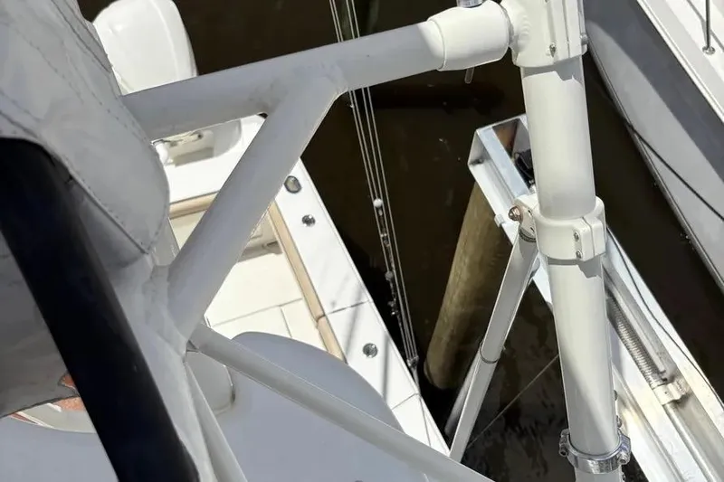  Yacht Photos Pics 2017 Jupiter 38 FS boat deck with white railing and dock view.