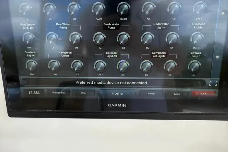  Yacht Photos Pics Control panel of a 2017 Jupiter 38 FS boat with Garmin interface.