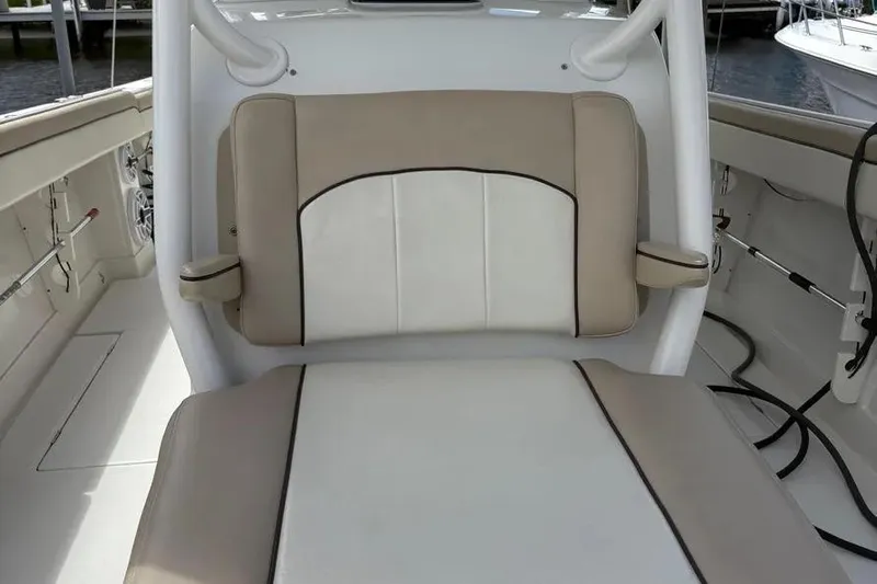  Yacht Photos Pics 2017 Jupiter 38 FS boat interior with beige and white cushioned seating.