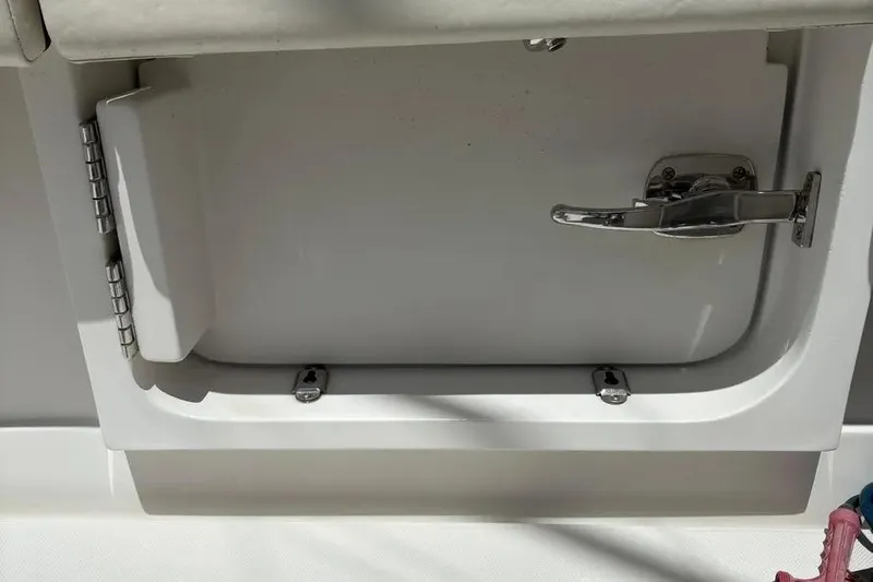  Yacht Photos Pics 2017 Jupiter 38 FS boat compartment with chrome handle and hinges.