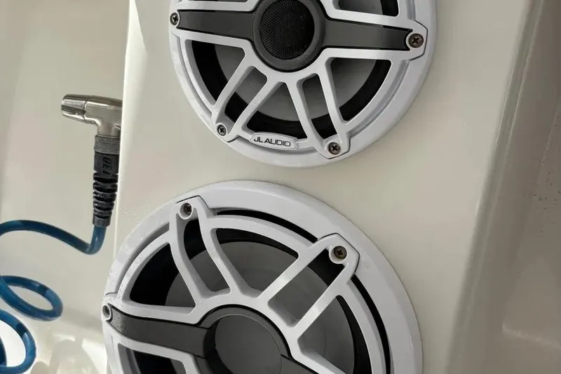  Yacht Photos Pics Speakers on a 2017 Jupiter 38 FS boat with JL Audio branding and coiled blue cable.