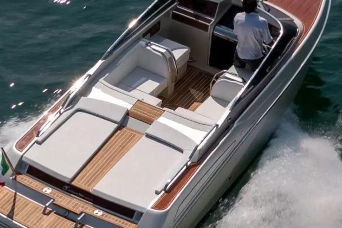 Luxurious 2022 Ecoline Marine Ecolux 850 motorboat cruising on water.