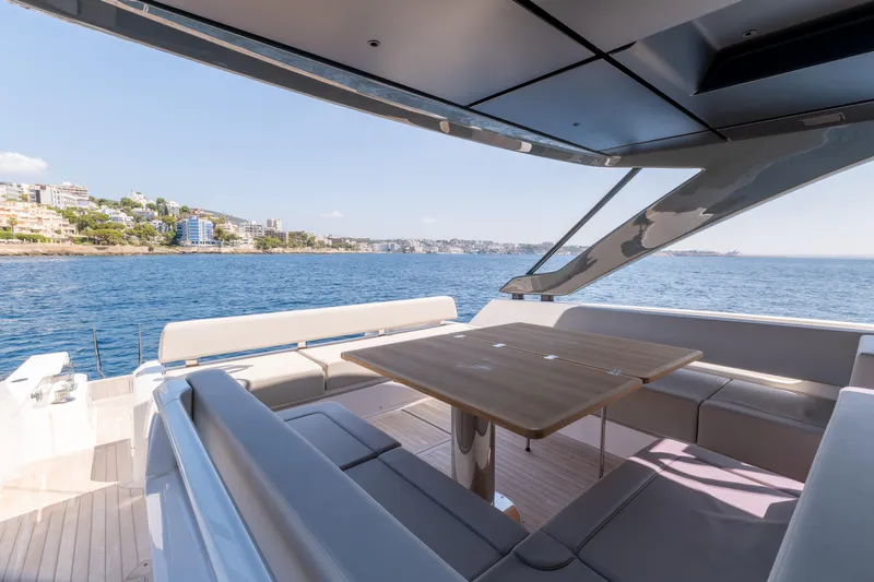  Yacht Photos Pics Luxurious 2024 Bluegame 54 yacht interior with ocean view and modern seating area.