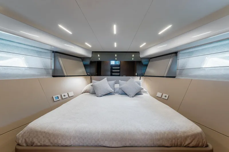  Yacht Photos Pics Luxurious interior of 2024 Bluegame 54 yacht with modern bedroom design.