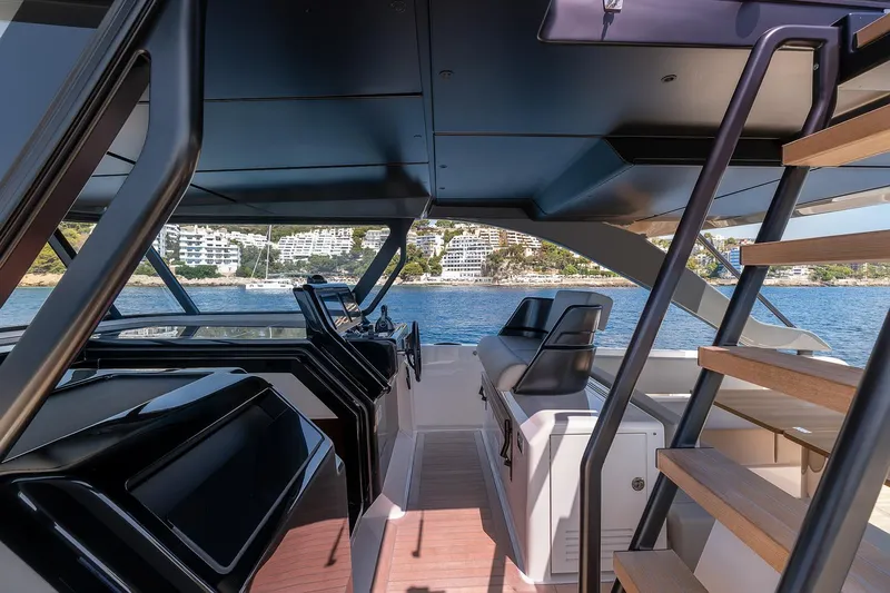  Yacht Photos Pics Interior view of 2024 Bluegame 54 yacht, featuring modern design and waterfront scenery.