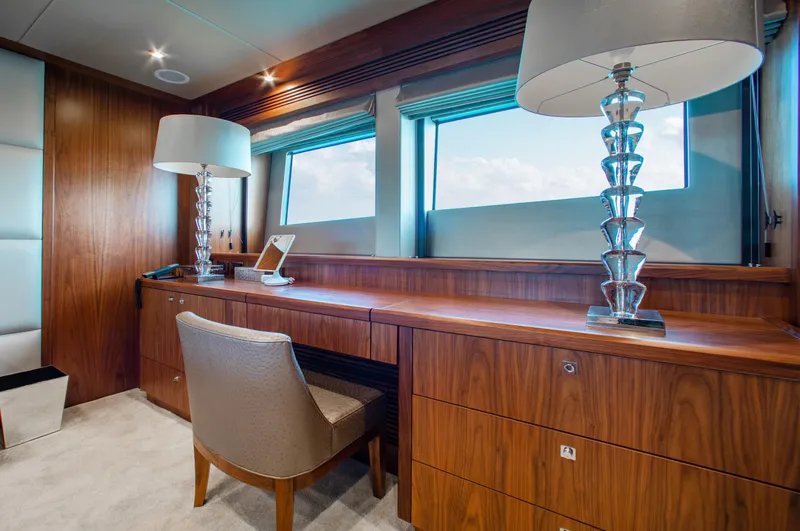 Marin Yacht Photos Pics Luxurious Sunseeker 131 yacht interior, 2014 model, featuring elegant wooden desk and modern decor.