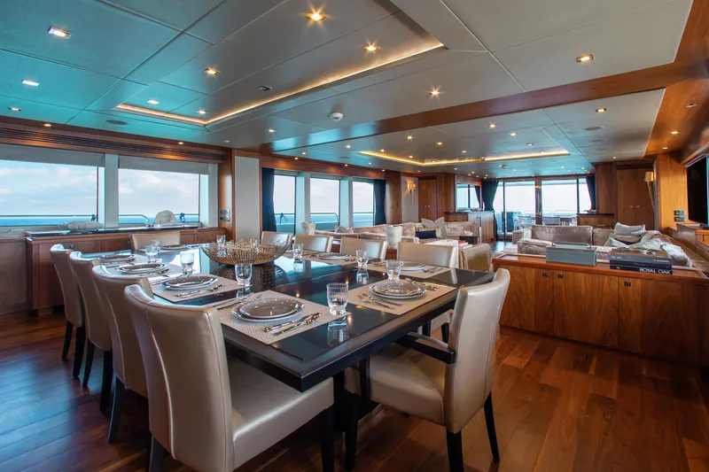 Marin Yacht Photos Pics Luxurious dining area on a 2014 Sunseeker 131 yacht with elegant table settings.