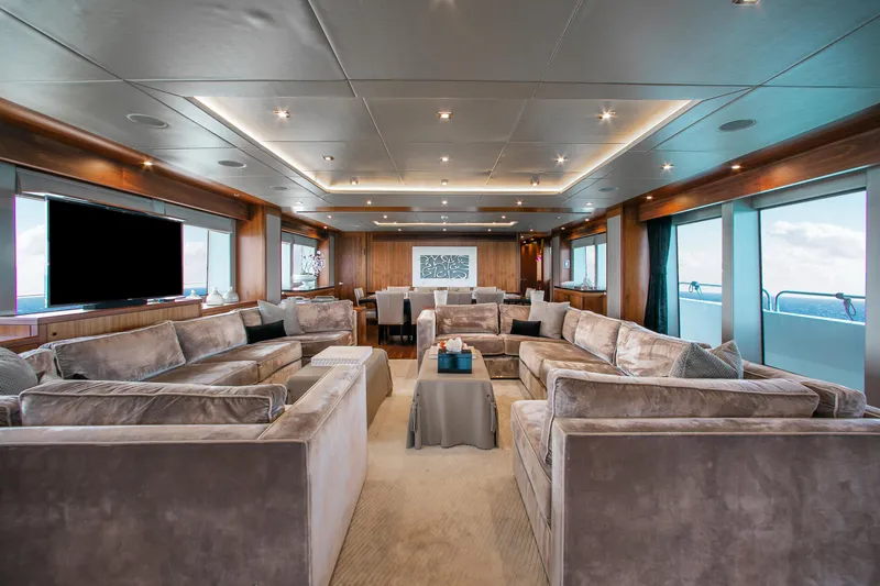 Marin Yacht Photos Pics Luxurious interior of 2014 Sunseeker 131 yacht with plush seating and modern decor.