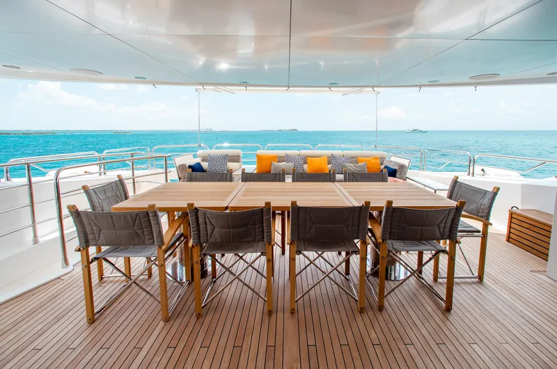 Marin Yacht Photos Pics Luxury outdoor dining area on Sunseeker 131 yacht, 2014 model, with ocean view.