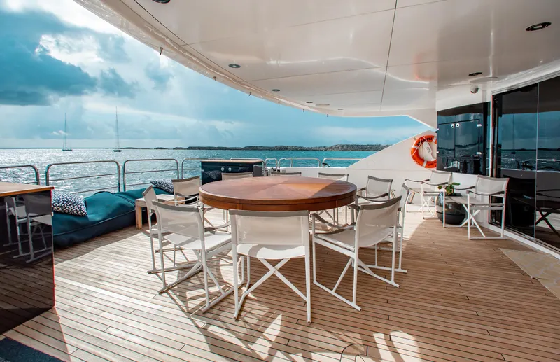 Marin Yacht Photos Pics Spacious deck of 2014 Sunseeker 131 yacht with seating and ocean view.