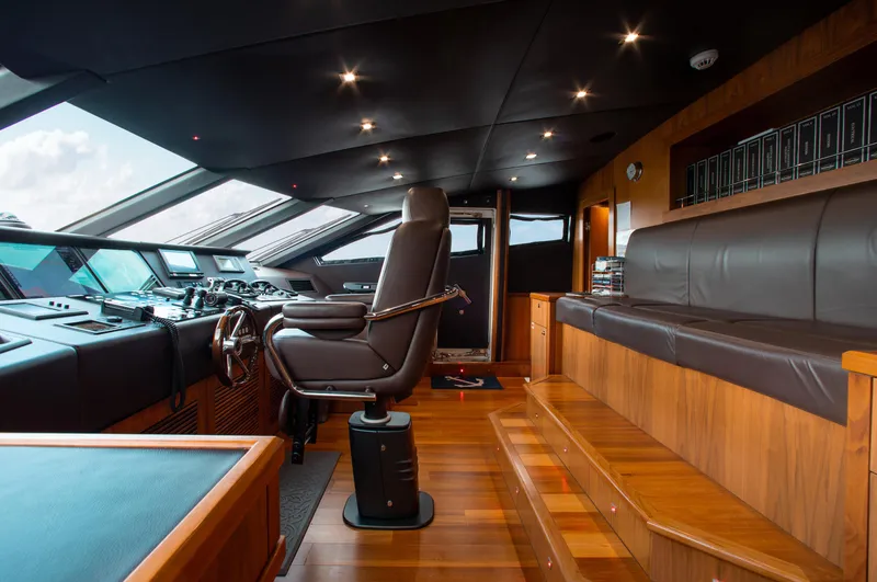 Marin Yacht Photos Pics Interior of 2014 Sunseeker 131 yacht's helm station with leather seating and advanced controls.