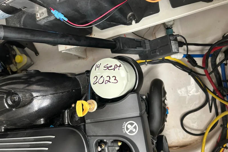  Yacht Photos Pics Engine compartment of 2018 Four Winns Horizon H290 with maintenance date labeled "14 Sept 2023".