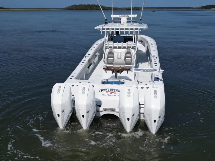  Yacht Photos Pics 2022 Freeman 37VH boat with four engines on calm water.