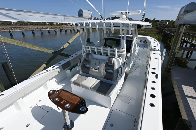  Yacht Photos Pics Freeman 37VH 2022 boat docked, featuring spacious deck and modern seating.