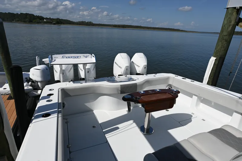  Yacht Photos Pics 2022 Freeman 37VH boat with dual engines docked on a calm lake.