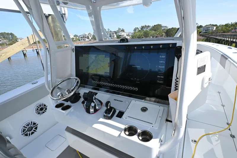  Yacht Photos Pics 2022 Freeman 37VH boat cockpit with advanced navigation system and controls.