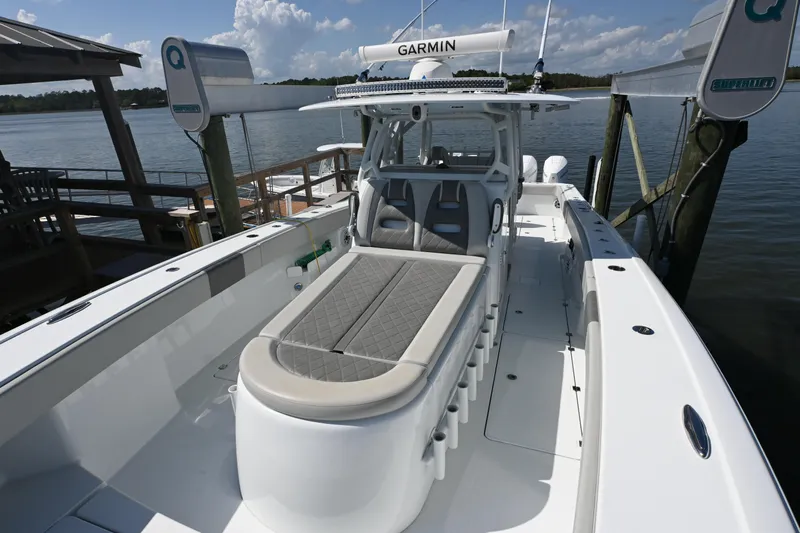  Yacht Photos Pics 2022 Freeman 37VH boat with Garmin equipment, docked by the water.