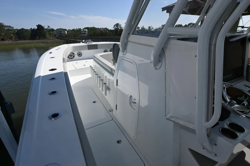  Yacht Photos Pics 2022 Freeman 37VH boat deck with sleek design and modern features, docked by the water.