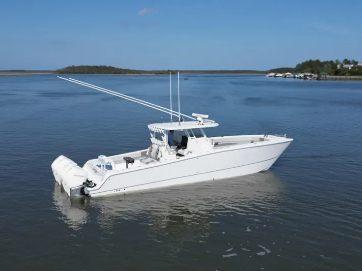  Yacht Photos Pics 2022 Freeman 37VH boat on calm water, featuring dual outboard motors.