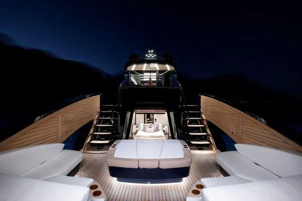  Yacht Photos Pics Luxurious 2023 Lazzara LSX yacht at night, featuring elegant deck and modern design.
