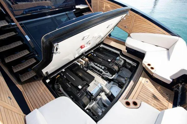  Yacht Photos Pics 2023 Lazzara LSX yacht engine compartment with open hatch, showcasing powerful engines.
