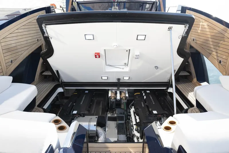  Yacht Photos Pics 2023 Lazzara LSX yacht engine compartment with open hatch, showcasing modern design and technology.