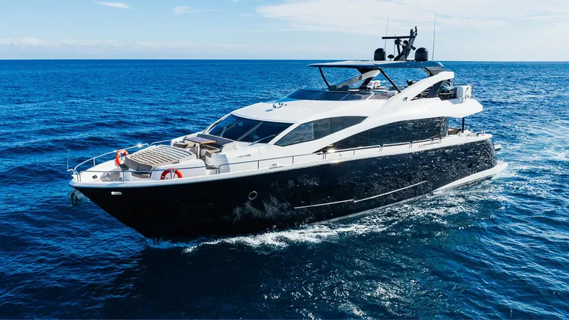 Golden Ours Yacht Photos Pics Luxurious 2019 Sunseeker Motoryacht cruising on open blue sea.