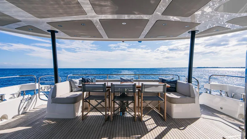 Golden Ours Yacht Photos Pics Luxurious 2019 Sunseeker Motoryacht deck with seating, overlooking the ocean.