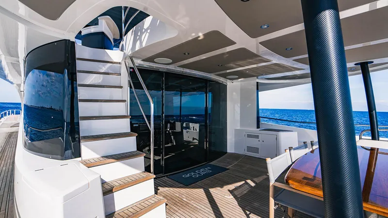 Golden Ours Yacht Photos Pics Luxurious 2019 Sunseeker motoryacht deck with modern design and ocean view.