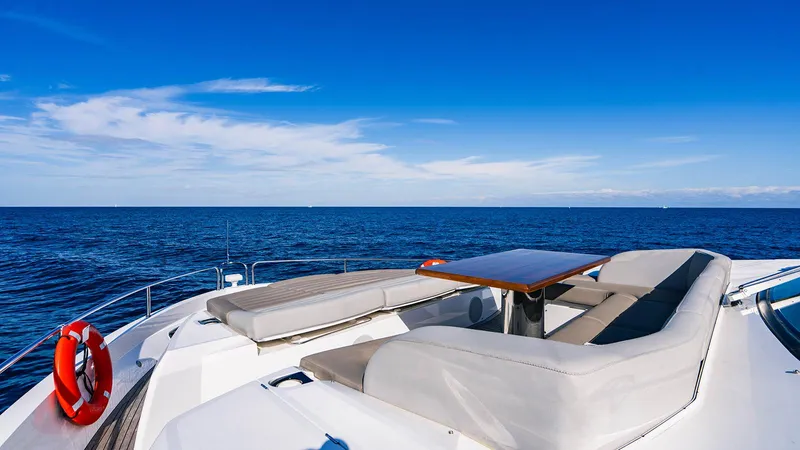 Golden Ours Yacht Photos Pics Luxurious 2019 Sunseeker Motoryacht deck with ocean view and seating area.