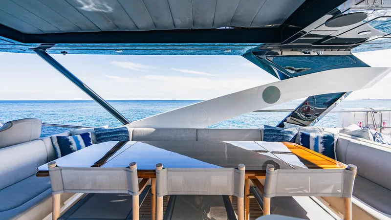 Golden Ours Yacht Photos Pics Luxurious Sunseeker Motoryacht 2019 with elegant outdoor seating and ocean view.