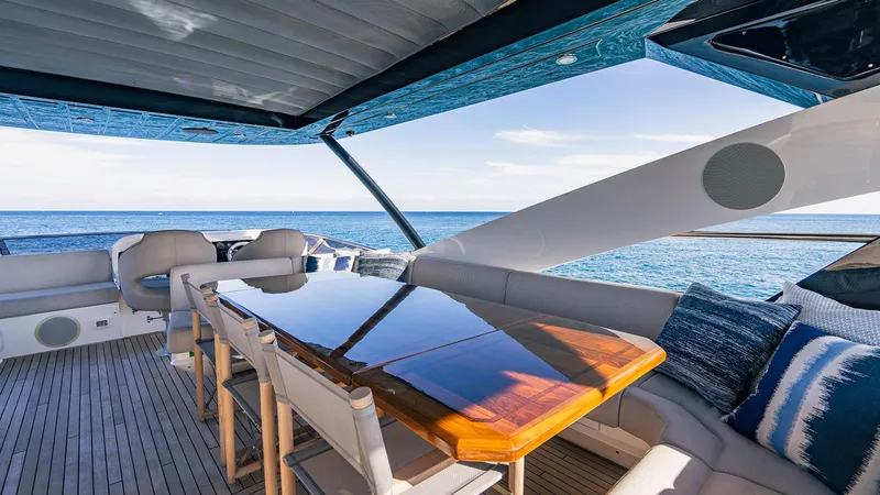 Golden Ours Yacht Photos Pics Luxurious 2019 Sunseeker Motoryacht deck with elegant seating and ocean view.
