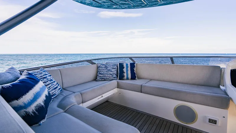 Golden Ours Yacht Photos Pics Luxurious Sunseeker 2019 motoryacht deck with plush seating and ocean view.