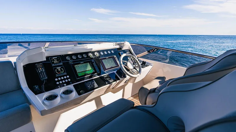 Golden Ours Yacht Photos Pics Luxurious 2019 Sunseeker Motoryacht helm with ocean view and advanced navigation systems.