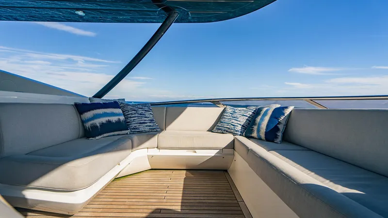 Golden Ours Yacht Photos Pics Luxurious Sunseeker Motoryacht 2019 with elegant outdoor seating and ocean view.