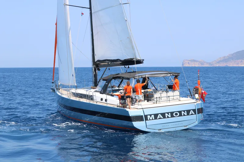 Manona (name Reserved For Owner) Yacht Photos Pics 2018 Beneteau Oceanis Yacht 62 sailing on open sea with crew onboard.
