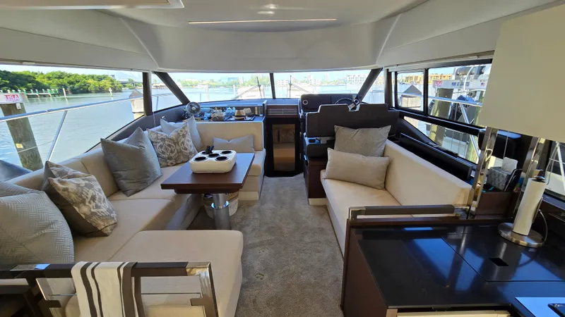  Yacht Photos Pics Luxurious interior of 2018 Prestige 460 yacht with elegant seating and scenic views.